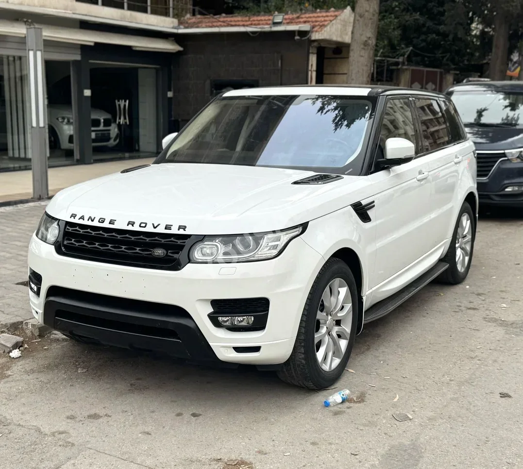 Land Rover  Range Rover  Sport  2015  Automatic  159,000 km  6  4WD  SUV  White  Gasoline