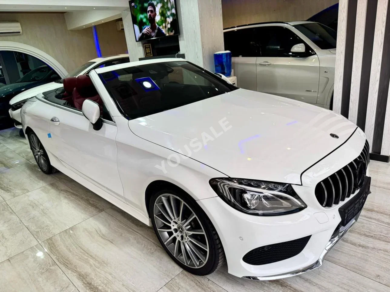 Mercedes-Benz  C-Class  200  2018  Automatic  115,000 km  4  RWD  Convertible  White  Gasoline