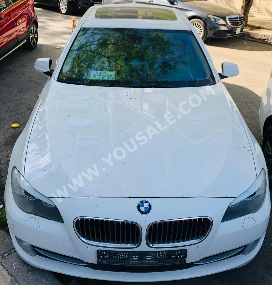 BMW  5-Series  520i  2015  Automatic  136,000 km  4  FWD  Sedan  White  Gasoline