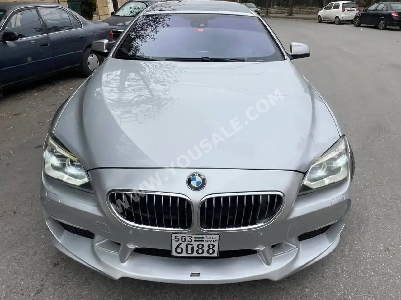 بي ام دبليو  الفئة - السادسة  640i  2013  اتوماتيك  120,000 كم  6  دفع خلفي  سيدان  رمادي  بنزين