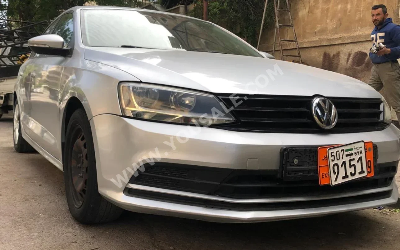 Volkswagen  Jetta  2016  Automatic  204,000 km  4  FWD  Sedan  Silver  Gasoline