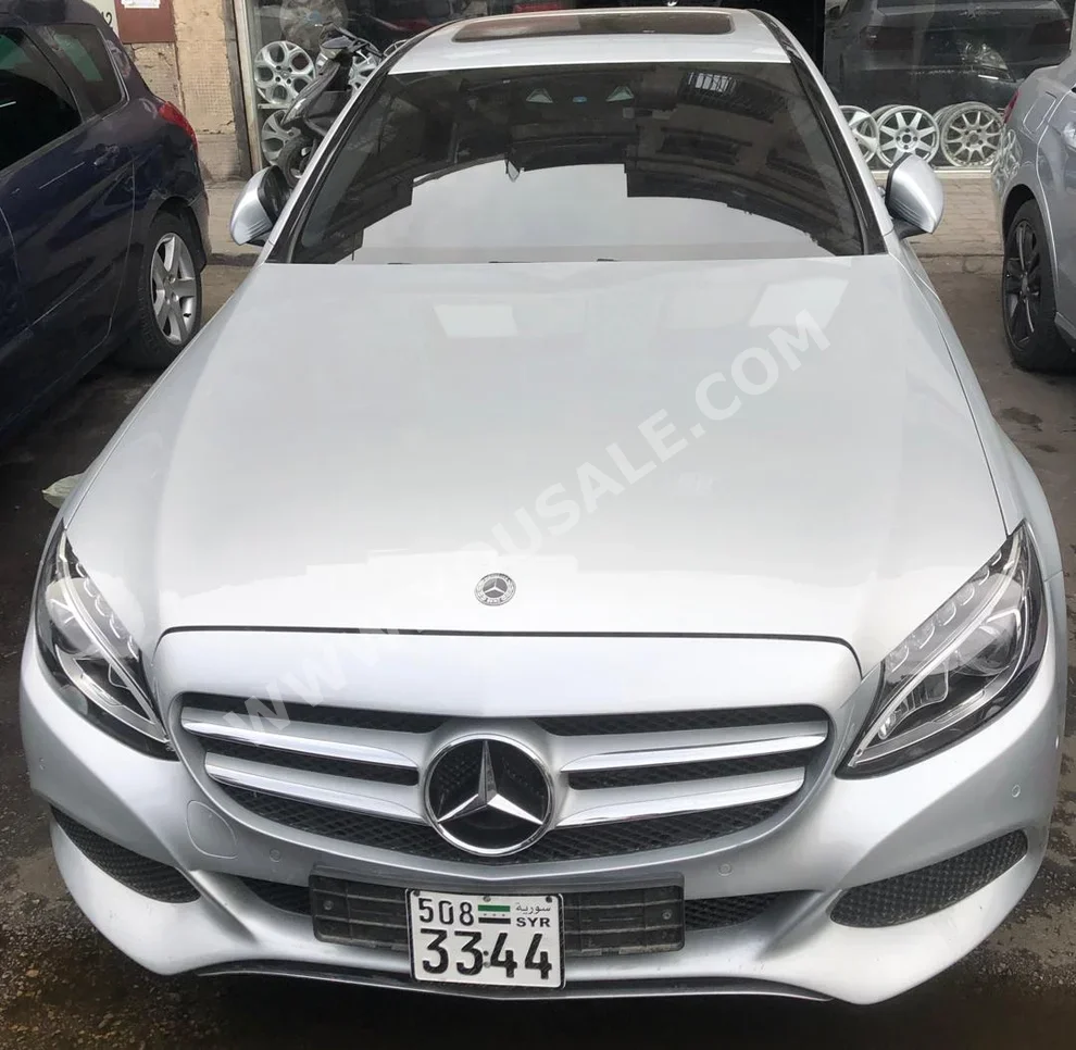 Mercedes-Benz  C-Class  220  2018  Automatic  215,000 km  4 Cylinder  RWD  Sedan  Silver  Gasoline