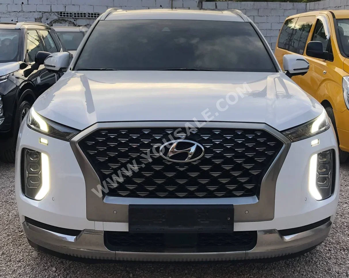 هيونداي  باليسيد  2022  اتوماتيك  95,000 كم  6 سلندر  دفع رباعي  اس يو في  أبيض  بنزين