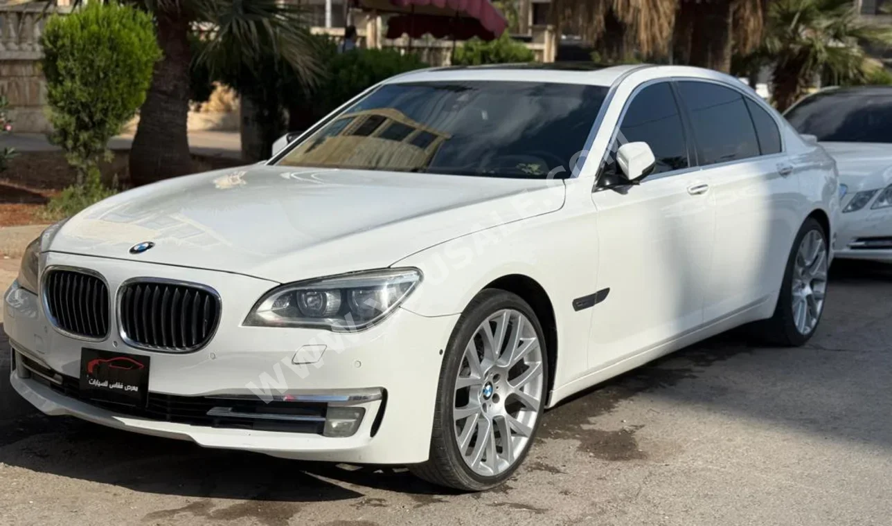 BMW  7-Series  730 I  2015  Automatic  80,000 km  6 Cylinder  RWD  Sedan  White  Gasoline