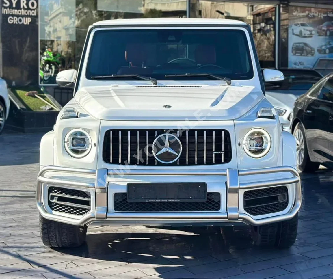 مرسيدس - بنز  جي - كلاس  63 AMG  2022  اتوماتيك  73,000 كم  8 سلندر  دفع رباعي  اس يو في  أبيض  بنزين