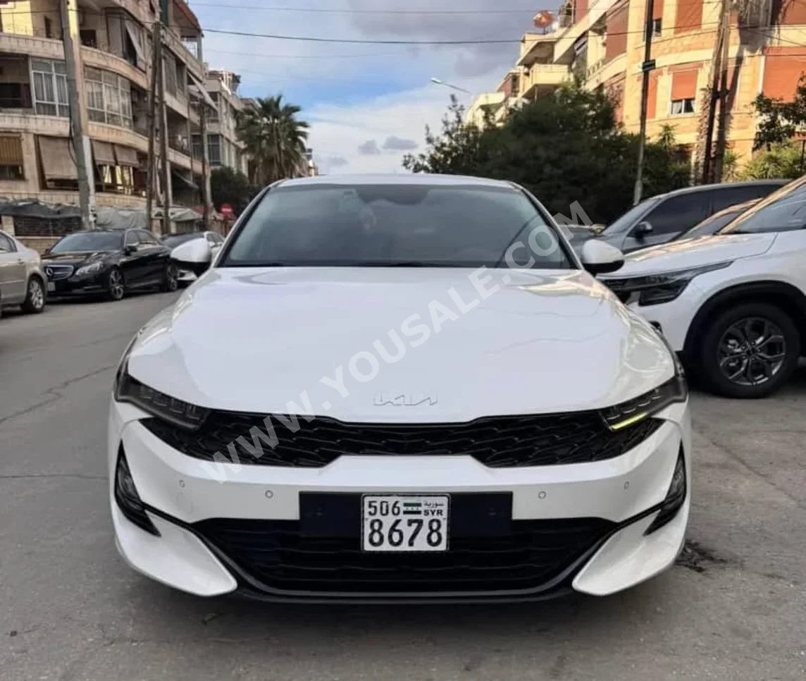 Kia  K5  2022  Automatic  47,000 km  4 Cylinder  FWD  Sedan  White  Gasoline