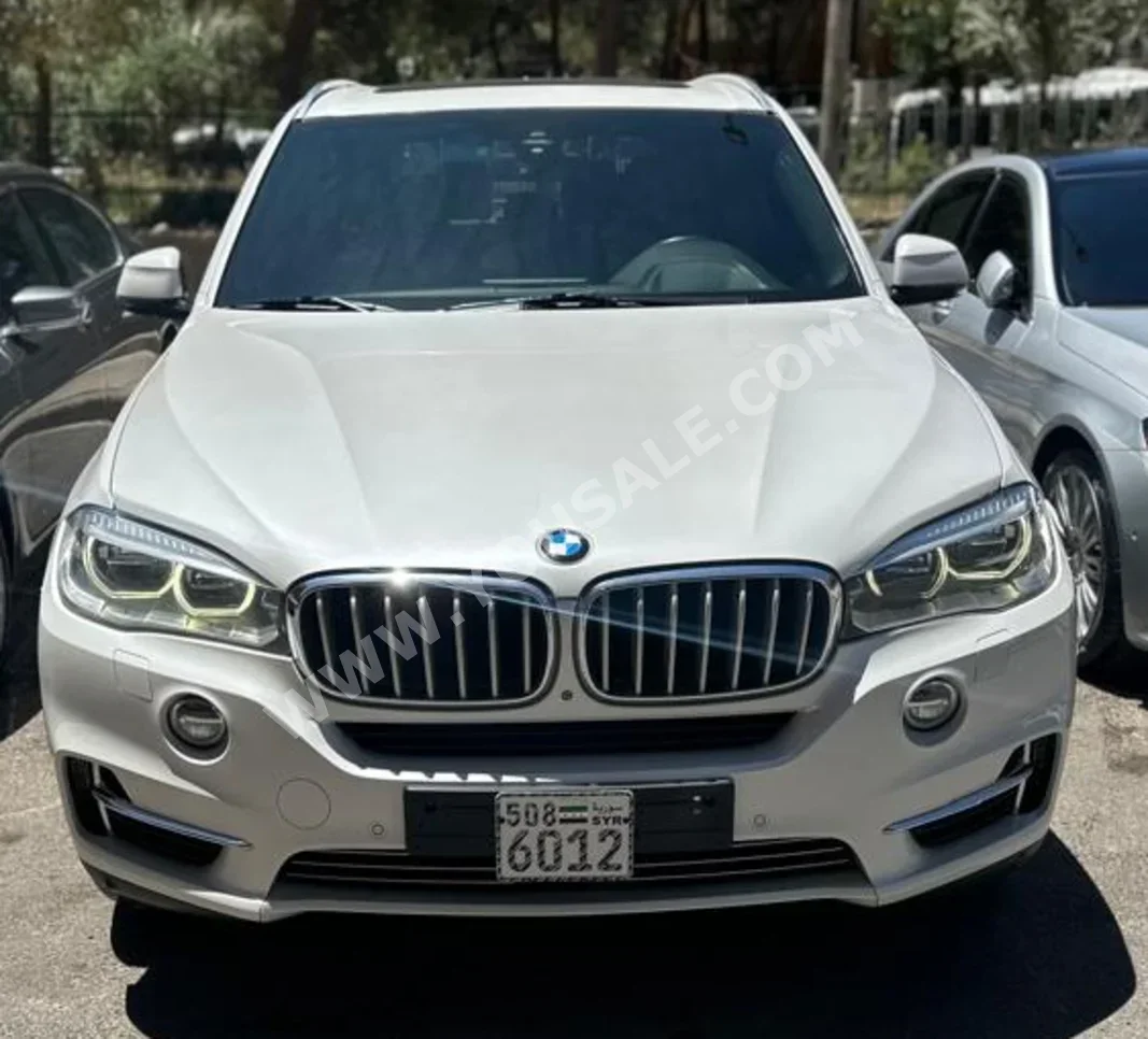 BMW  X-Series  5  2015  Automatic  148,000 km  6 Cylinder  4WD  SUV  White  Gasoline