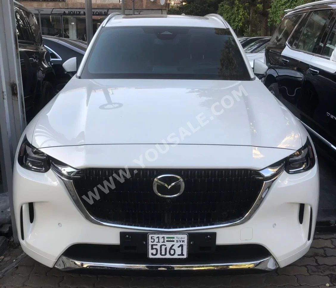 مازدا  سي اكس  9  2025  اتوماتيك  1,000 كم  4 سلندر  دفع رباعي  اس يو في  أبيض  بنزين
