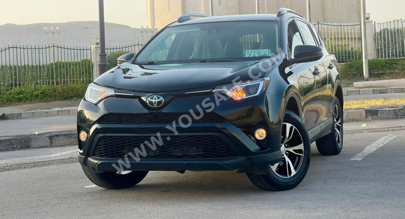 Toyota  Rav 4  2017  Automatic  166,000 km  4 Cylinder  4WD  SUV  Black  Gasoline
