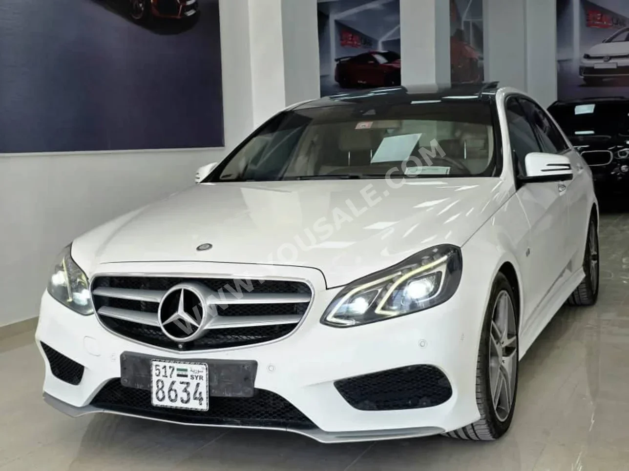 Mercedes-Benz  E-Class  300  2014  Automatic  92,000 km  6 Cylinder  RWD  Sedan  White  Gasoline