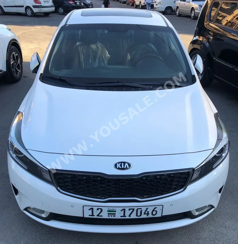 Kia  Cerato  2018  Automatic  160,000 km  4 Cylinder  FWD  Sedan  White  Gasoline