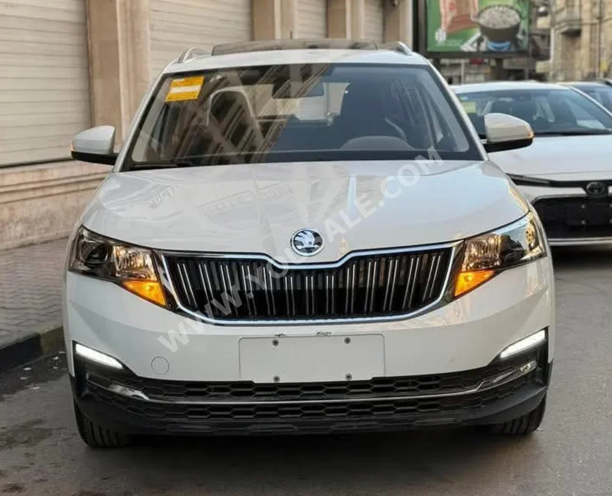 سكودا  كاميق  2024  اتوماتيك  0 كم  4 سلندر  دفع أمامي  اس يو في  أبيض  بنزين