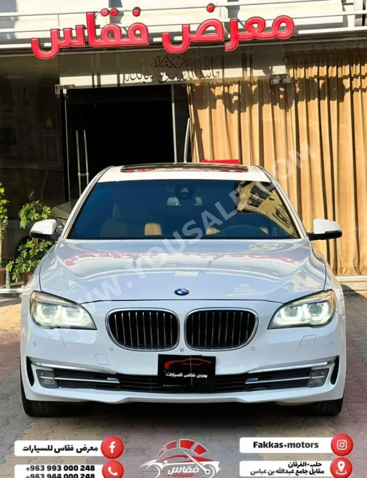 BMW  7-Series  730 Li  2015  Automatic  80,000 km  6 Cylinder  RWD  Sedan  White  Gasoline
