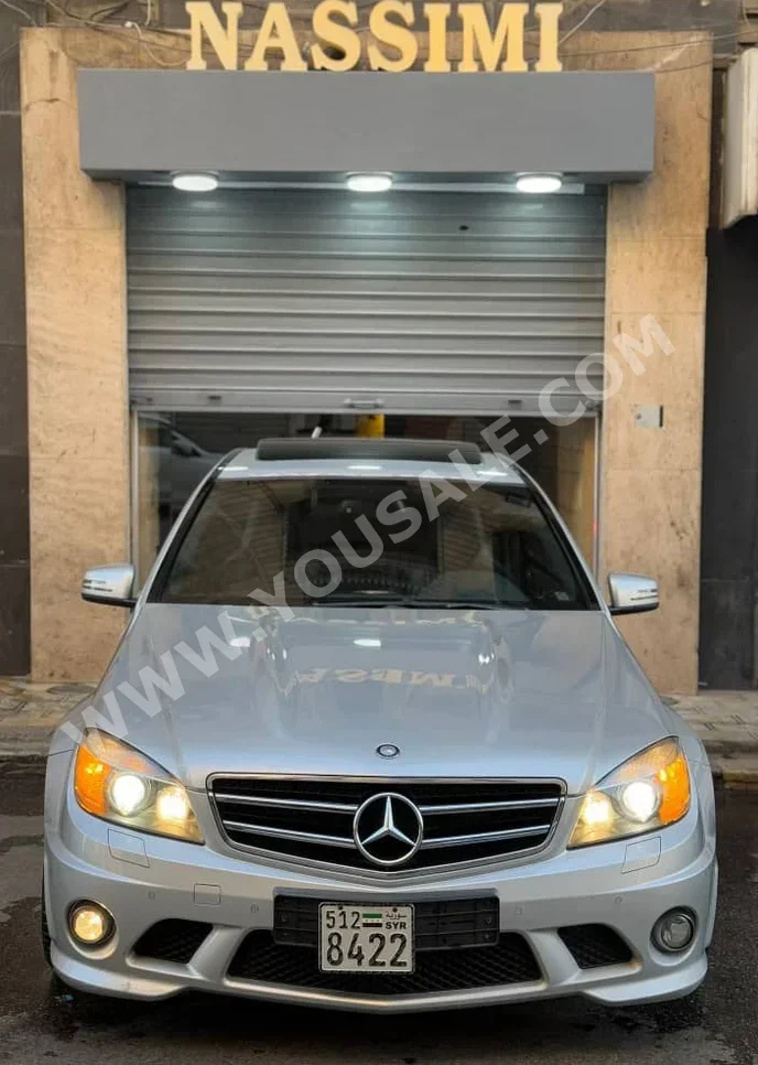 Mercedes-Benz  C-Class  63 AMG  2010  Automatic  55,000 km  8 Cylinder  RWD  Sedan  Silver  Gasoline