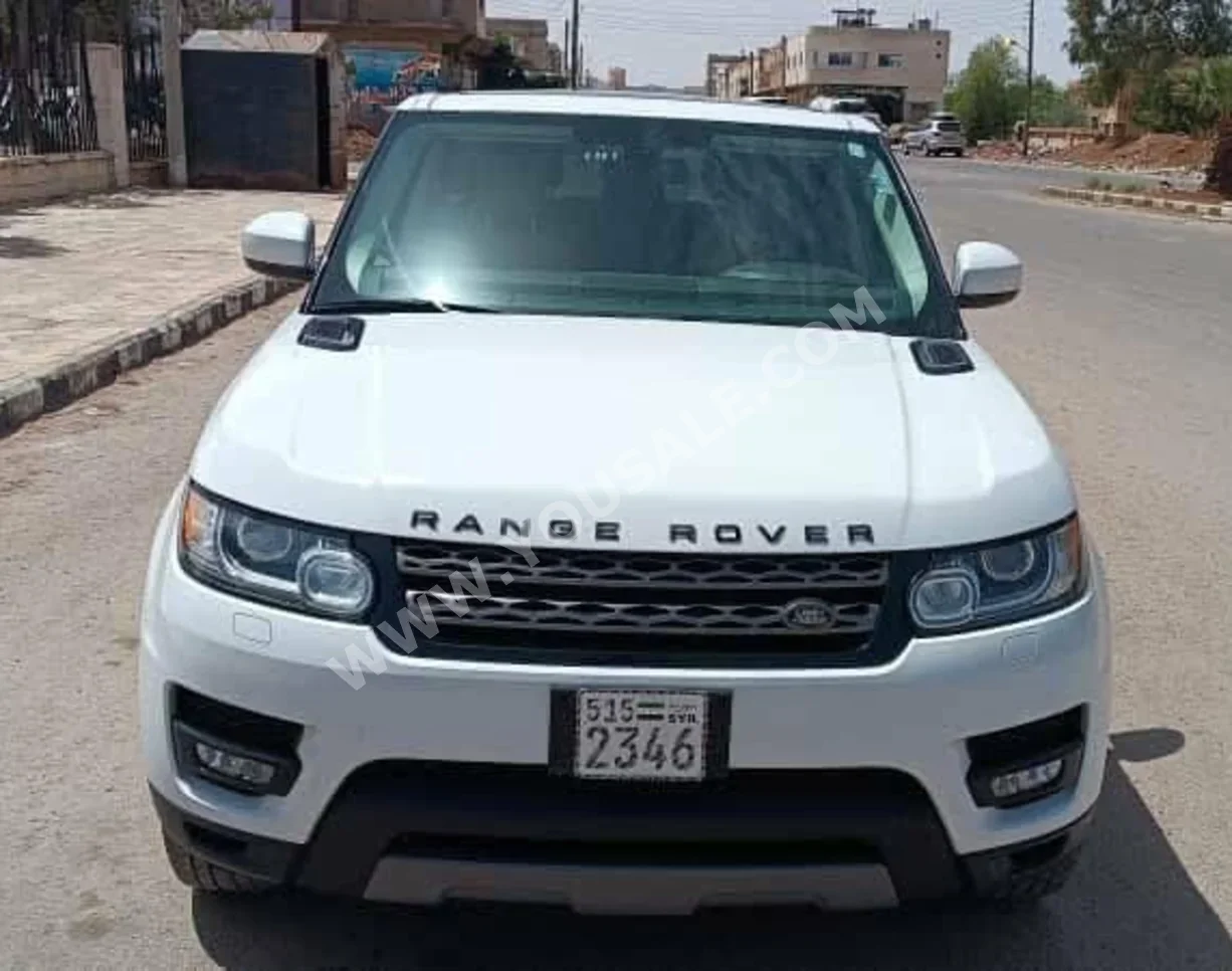 Land Rover  Range Rover  Sport  2014  Automatic  177,000 km  6 Cylinder  4WD  SUV  White  Gasoline