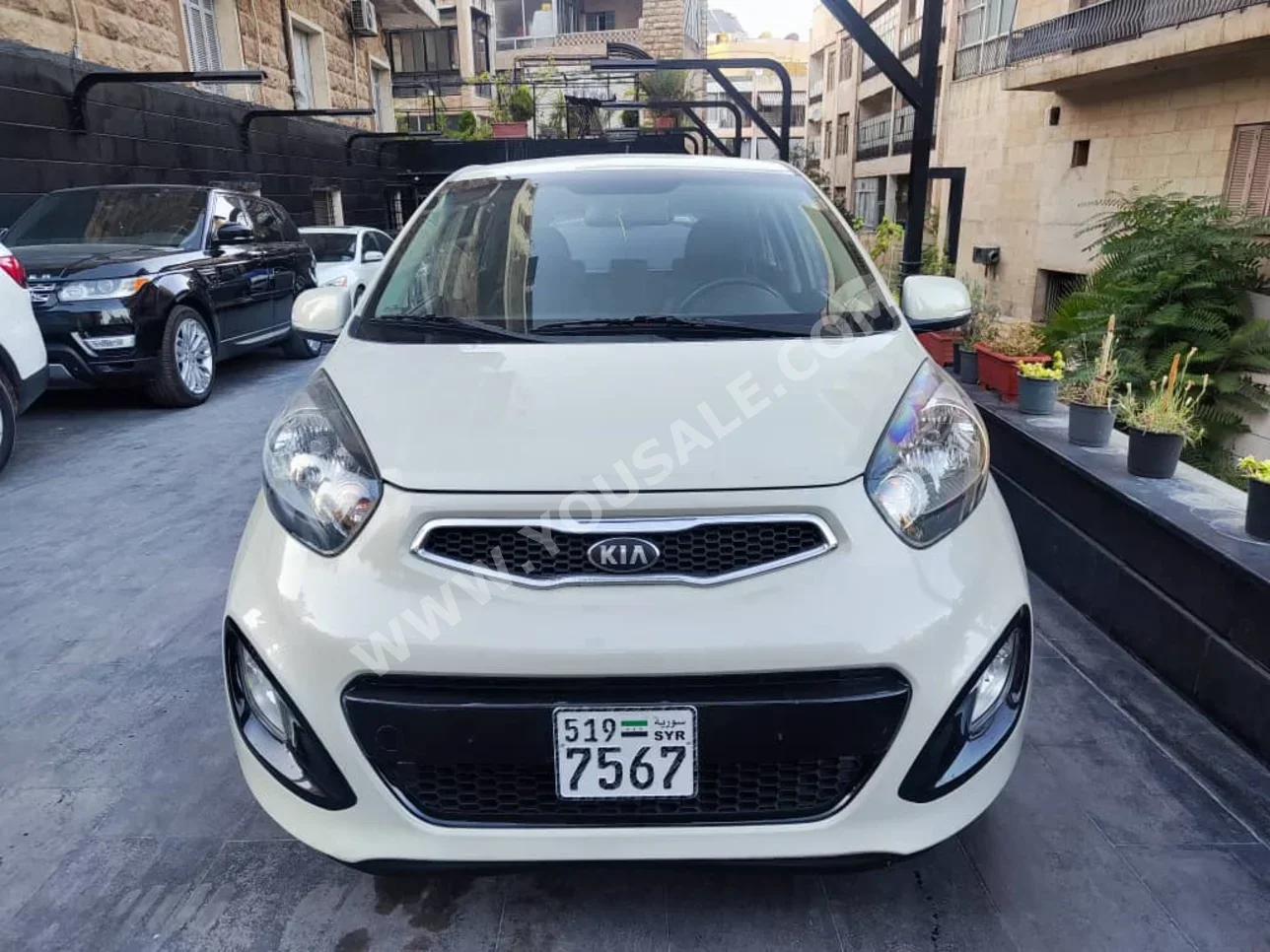 Kia  Picanto  2013  Automatic  64,000 km  4 Cylinder  FWD  Hatchback  Beige  Gasoline