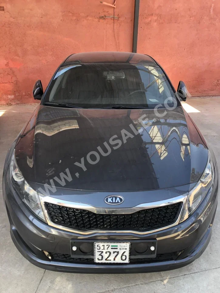 Kia  K5  2012  Automatic  180,000 km  4 Cylinder  FWD  Sedan  Gray  Gasoline
