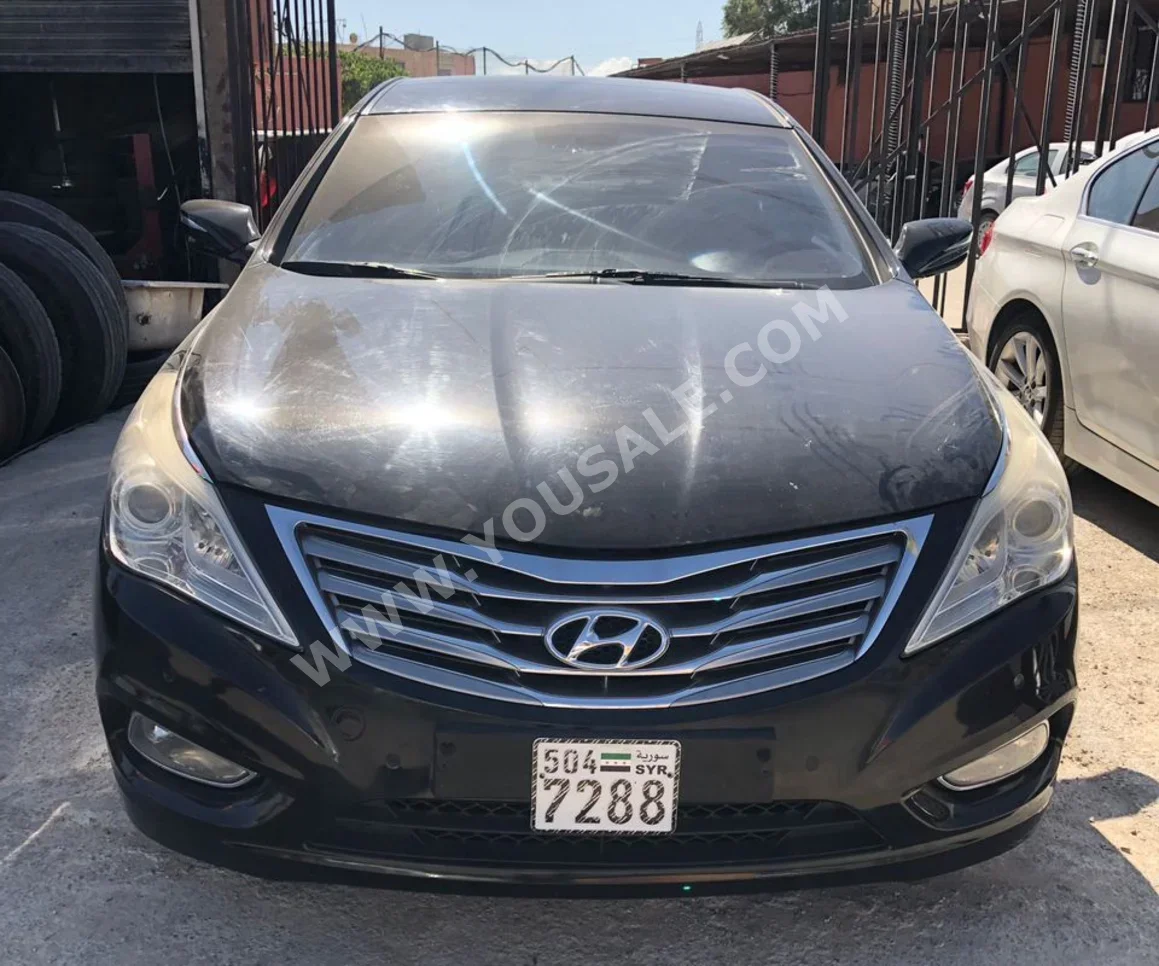 Hyundai  Grandeur  2012  Automatic  250,000 km  6 Cylinder  FWD  Sedan  Black  Gasoline