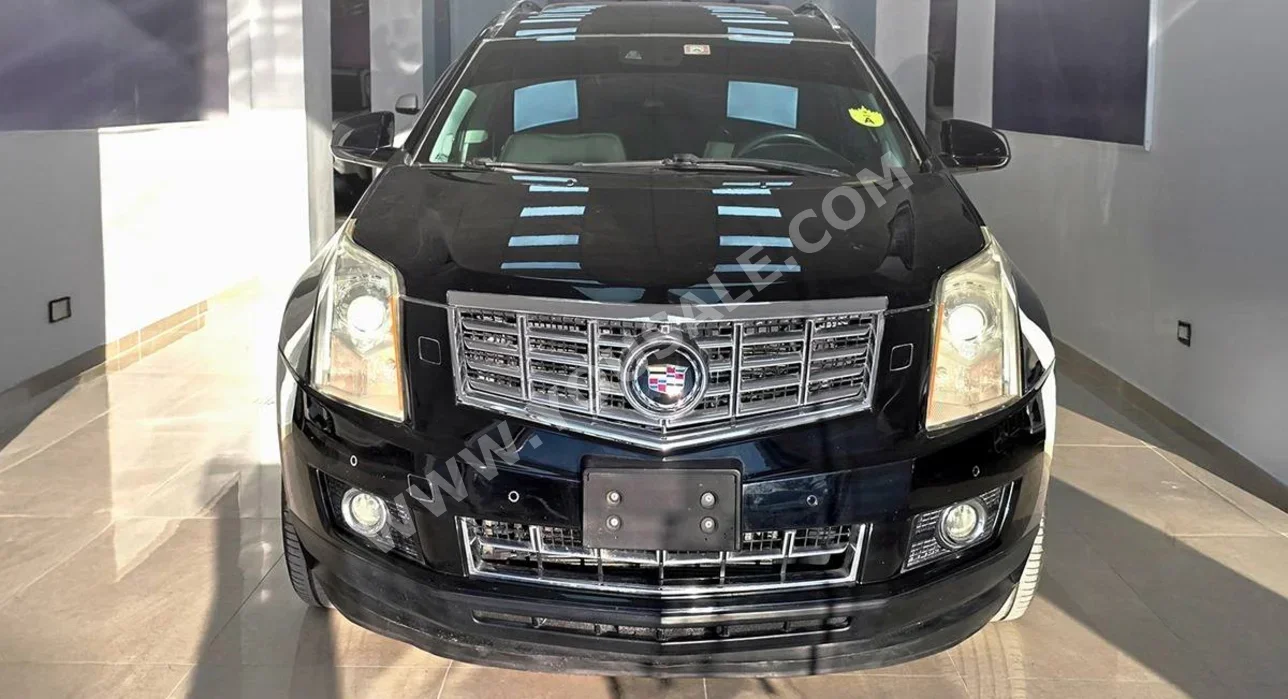 Cadillac  SRX  4  2014  Automatic  78,000 km  6 Cylinder  4WD  SUV  Black  Gasoline