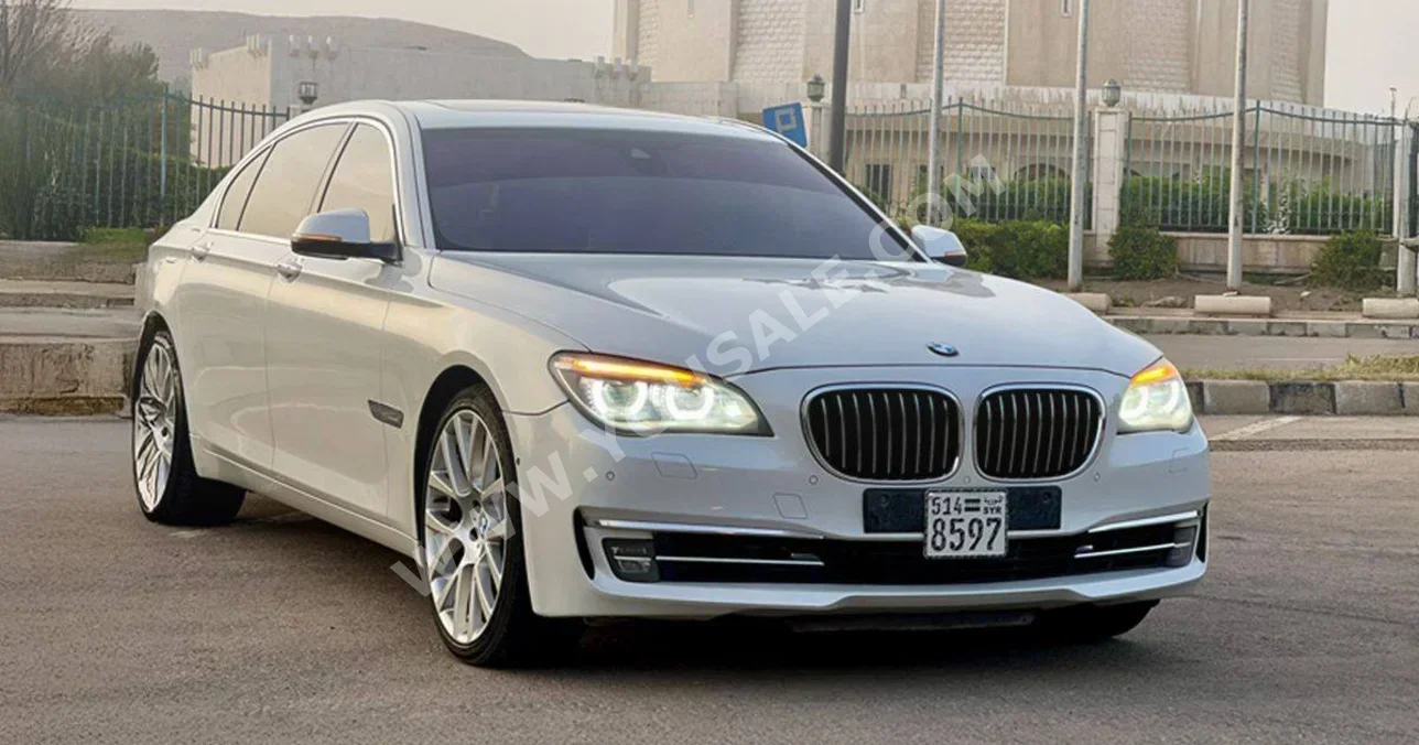 BMW  7-Series  740 Li  2014  Automatic  115,000 km  6 Cylinder  4WD  Sedan  White  Gasoline