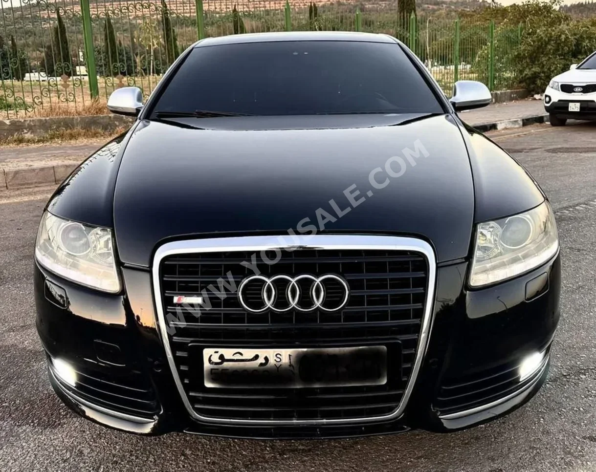 Audi  A6  2009  Automatic  109,000 km  4 Cylinder  RWD  Sedan  Black  Gasoline