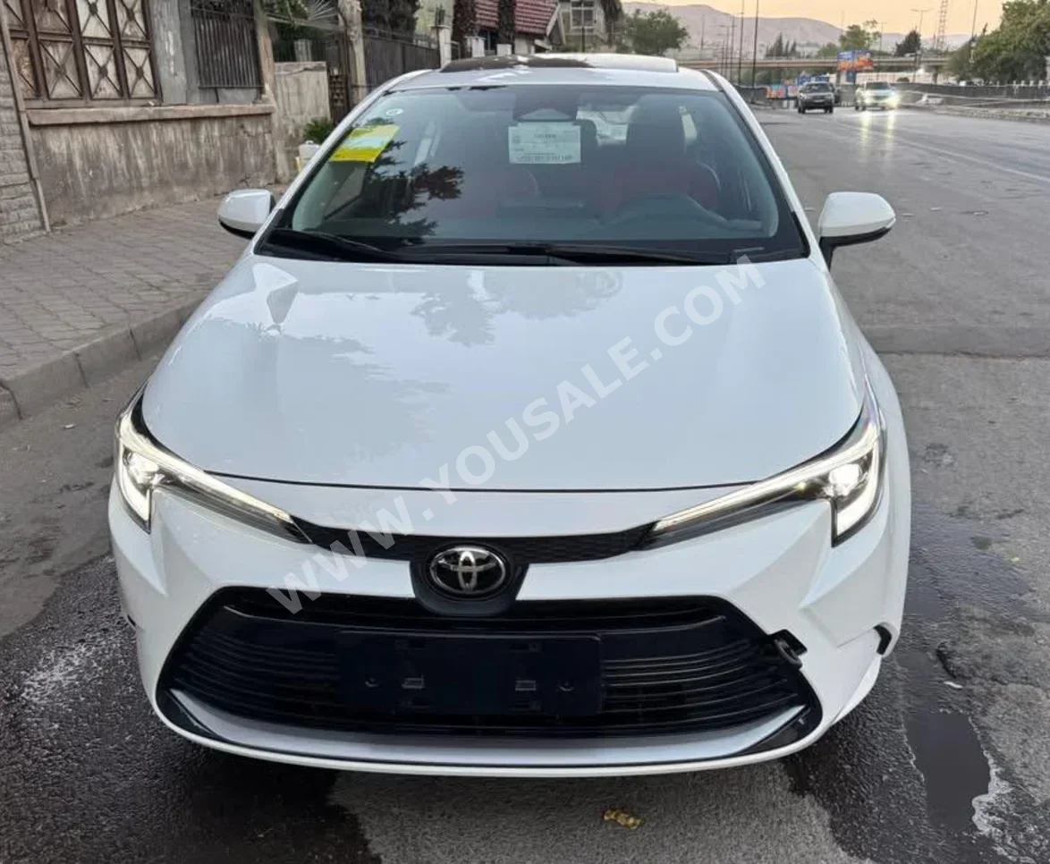 Toyota  Corolla  2025  Automatic  0 km  4 Cylinder  FWD  Sedan  White  Hybrid