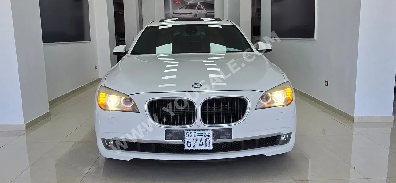 BMW  7-Series  750 Li  2011  Automatic  95,000 km  8 Cylinder  RWD  Sedan  White  Gasoline