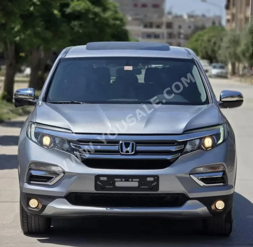 Honda  Pilot  2017  Automatic  100,000 km  6 Cylinder  AWD  SUV  Silver  Gasoline