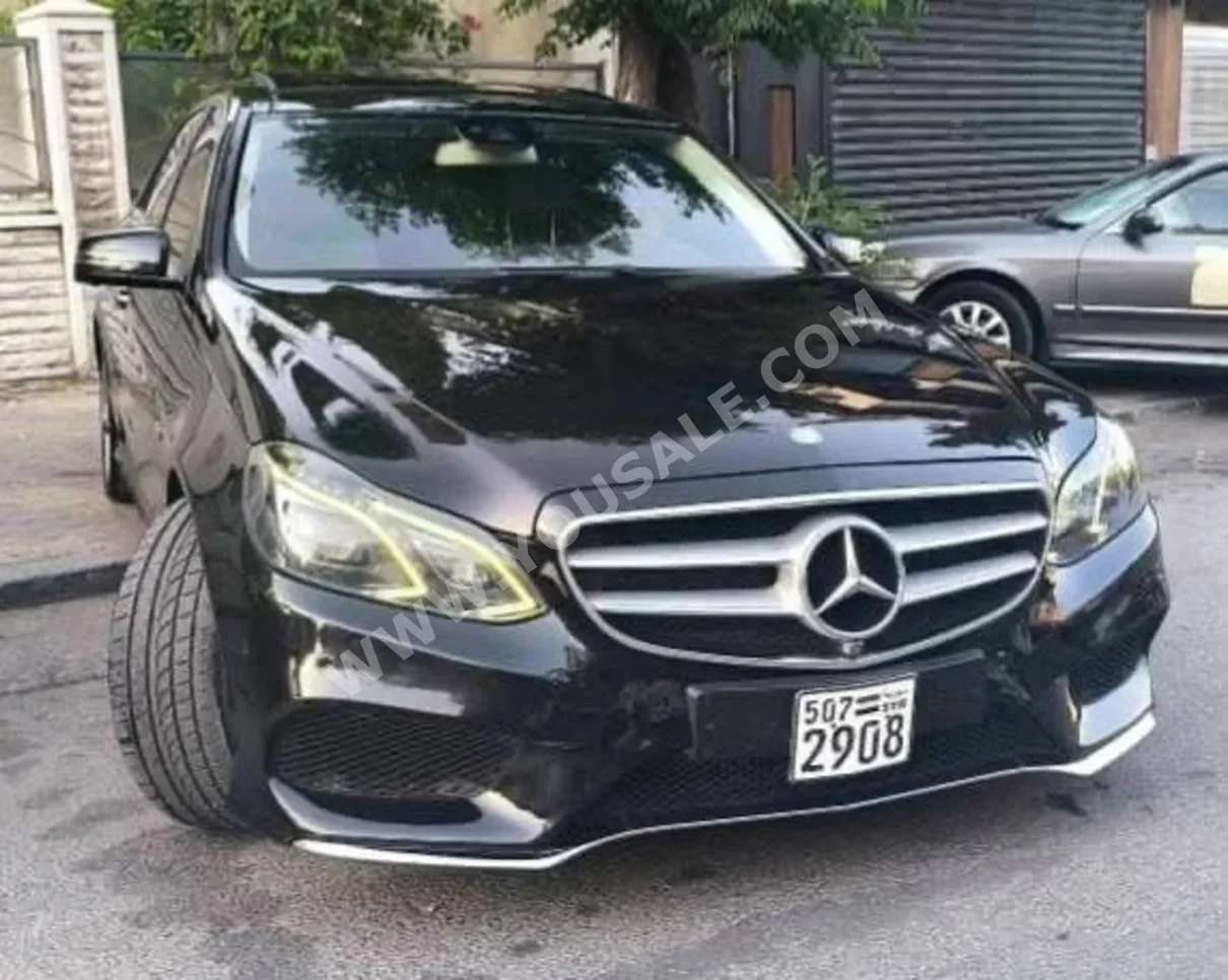 Mercedes-Benz  E-Class  300  2014  Automatic  150,000 km  4 Cylinder  FWD  Sedan  Black  Gasoline