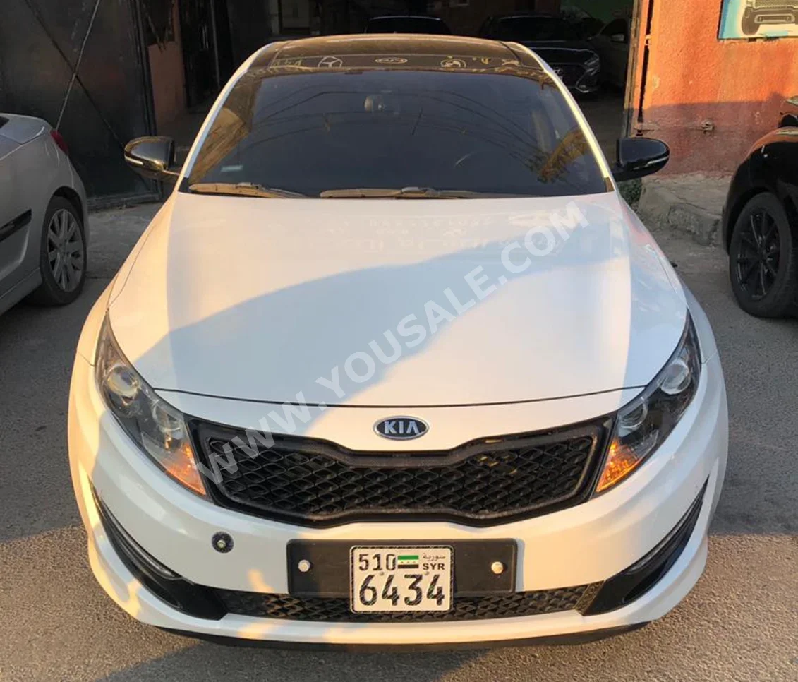 Kia  K5  2013  Automatic  217,000 km  4 Cylinder  FWD  Sedan  White  Gasoline