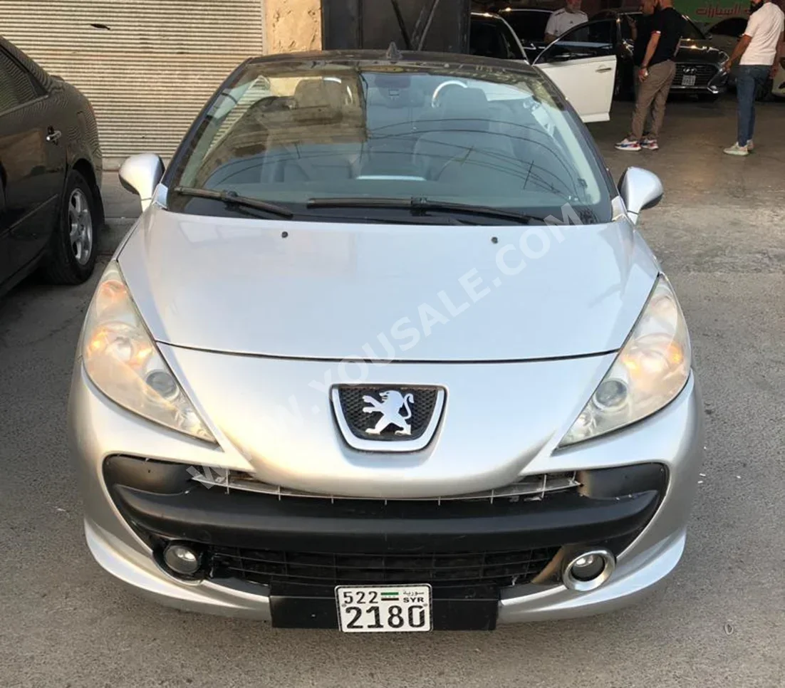 Peugeot  207  cc  2011  Automatic  152,000 km  4 Cylinder  RWD  Coupe / Sport  Silver  Gasoline