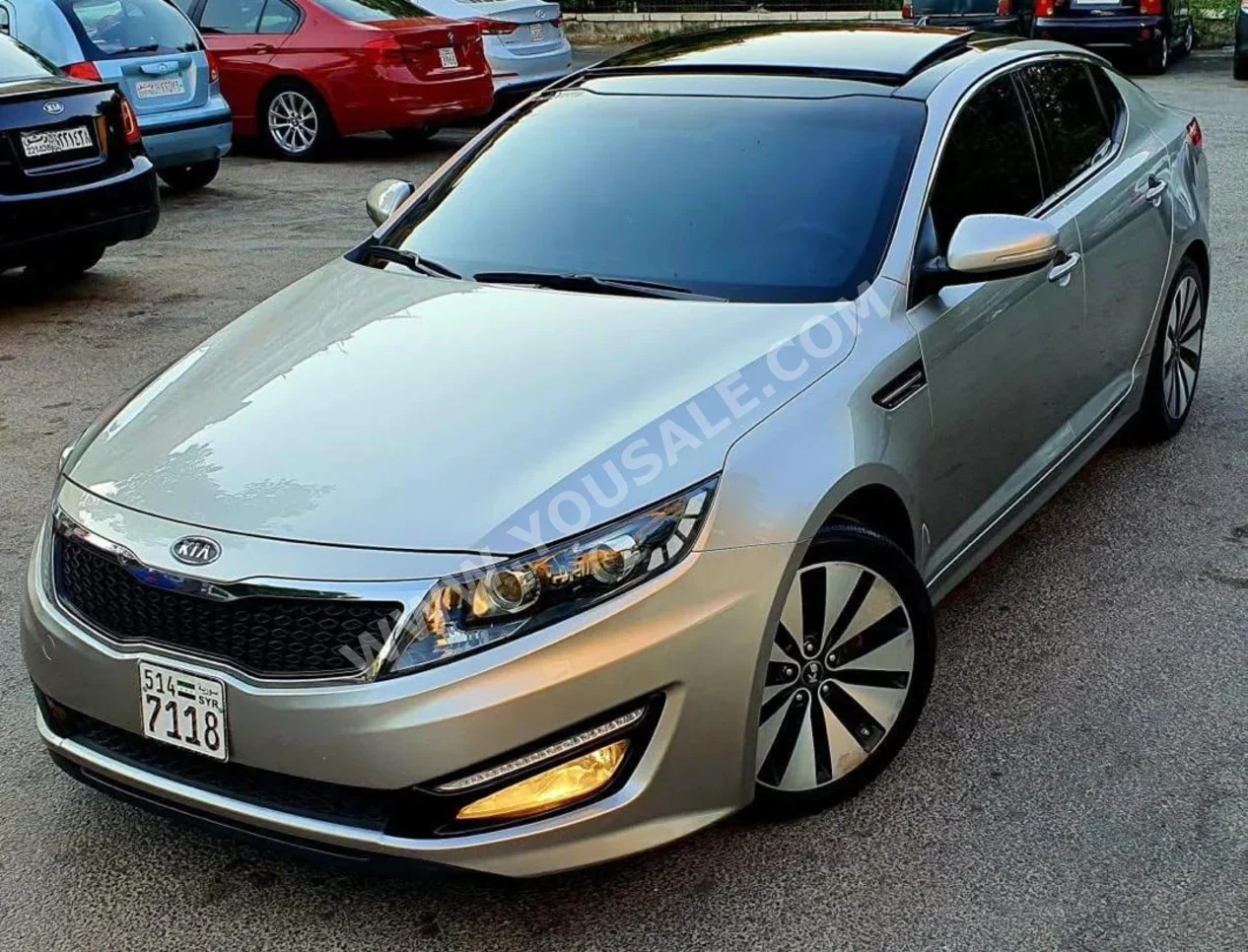 Kia  K5  2011  Automatic  137,000 km  4 Cylinder  FWD  Sedan  Silver  Gasoline
