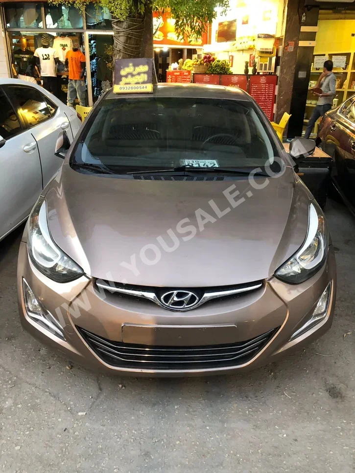 Hyundai  Elantra  2016  Automatic  124,000 km  4 Cylinder  FWD  Sedan  Brown  Gasoline