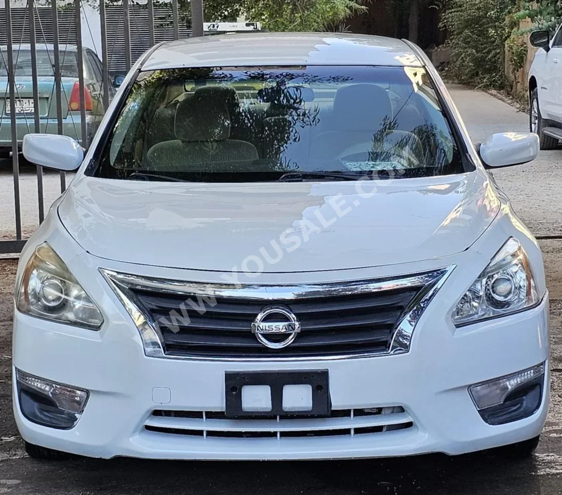 Nissan  Altima  2015  Automatic  145,000 km  4 Cylinder  FWD  Sedan  White  Gasoline