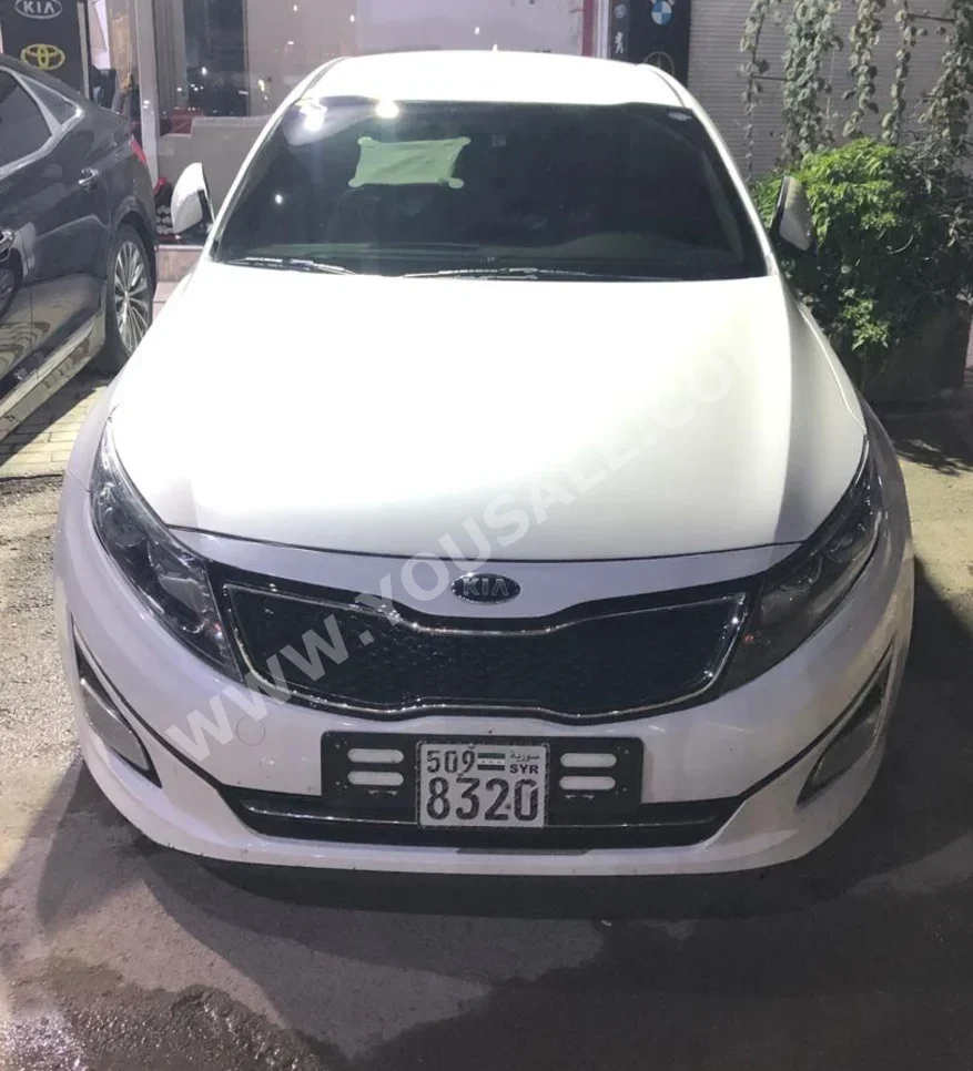 Kia  K5  2015  Automatic  70,000 km  4 Cylinder  FWD  Sedan  White  Gasoline