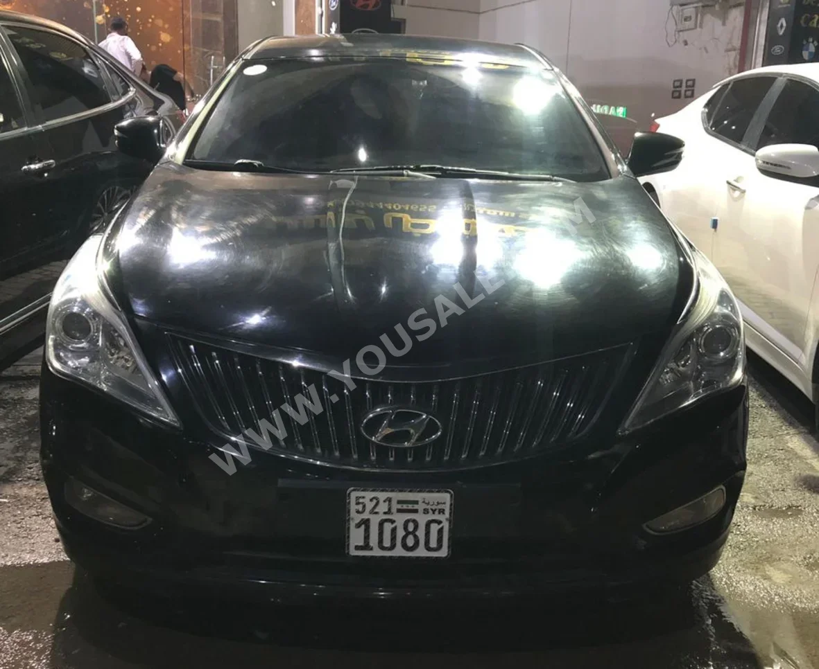 Hyundai  Azera  2015  Automatic  48,000 km  4 Cylinder  FWD  Sedan  Black  Gasoline