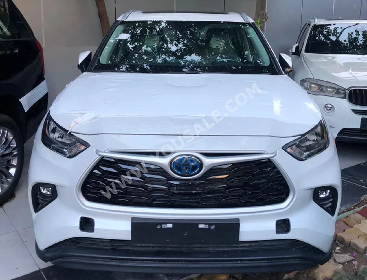 Toyota  Highlander  2025  Automatic  0 km  4 Cylinder  4WD  SUV  White  Hybrid  With Warranty