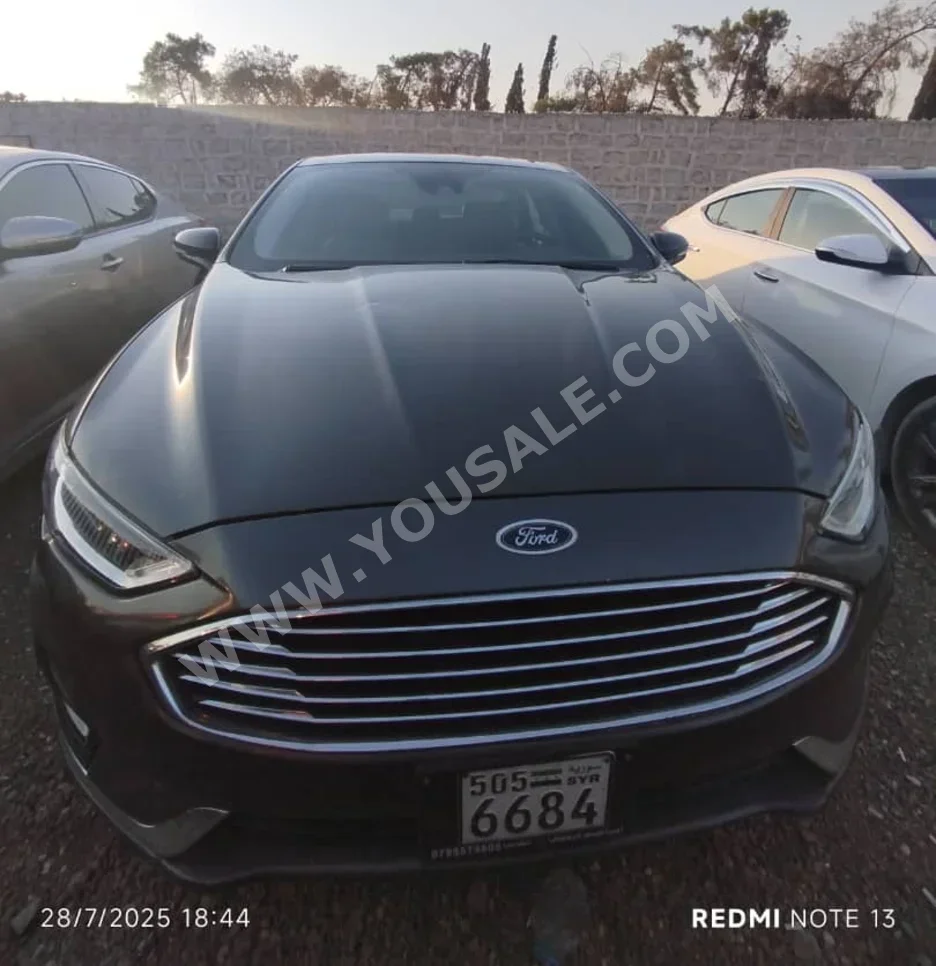 Ford  Fusion  2019  Automatic  120,000 km  4 Cylinder  FWD  Sedan  Black  Hybrid