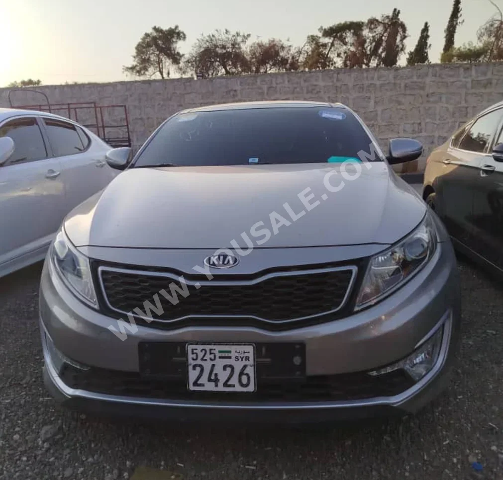 Kia  K5  2015  Automatic  150,000 km  4 Cylinder  FWD  Sedan  Silver  Hybrid