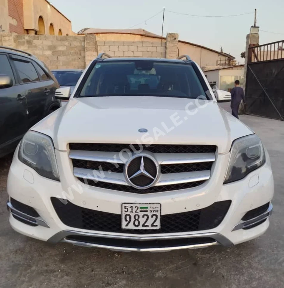 Mercedes-Benz  GLK-Class  220  2013  Automatic  170,000 km  4 Cylinder  4WD  SUV  White  Diesel