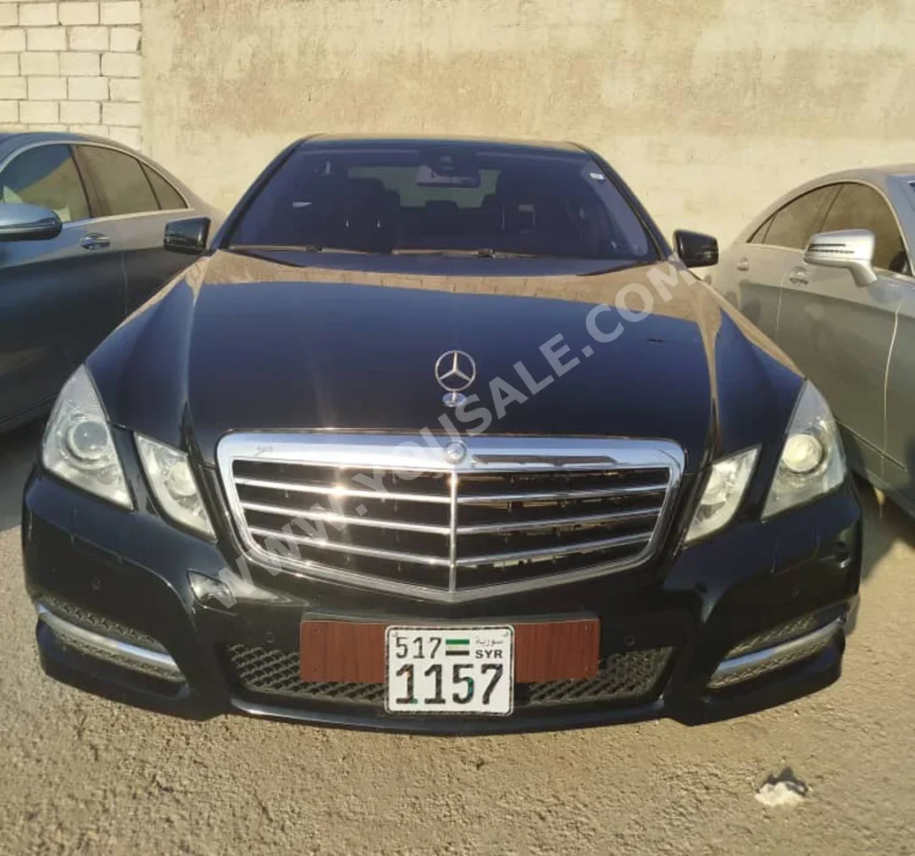 Mercedes-Benz  E-Class  200  2012  Automatic  171,000 km  6 Cylinder  RWD  Sedan  Black  Diesel