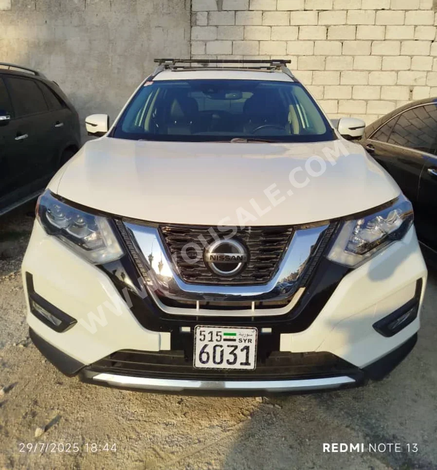 Nissan  Rogue  SL  2018  Automatic  98,000 km  4 Cylinder  FWD  SUV  White  Gasoline
