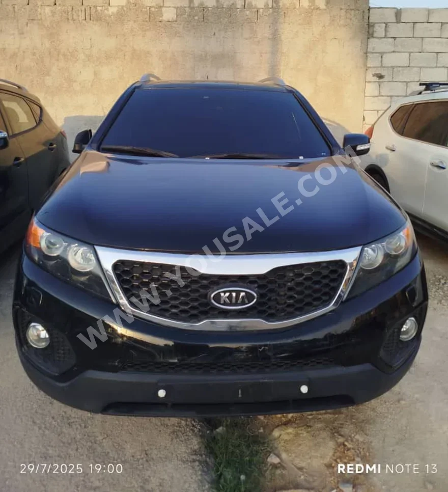 Kia  Sorento  2010  Automatic  259,784 km  4 Cylinder  FWD  SUV  Black  Diesel
