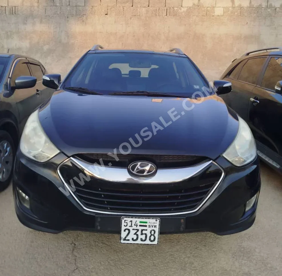 Hyundai  Tucson  LX 35  2010  Automatic  164,495 km  4 Cylinder  FWD  SUV  Black  Diesel