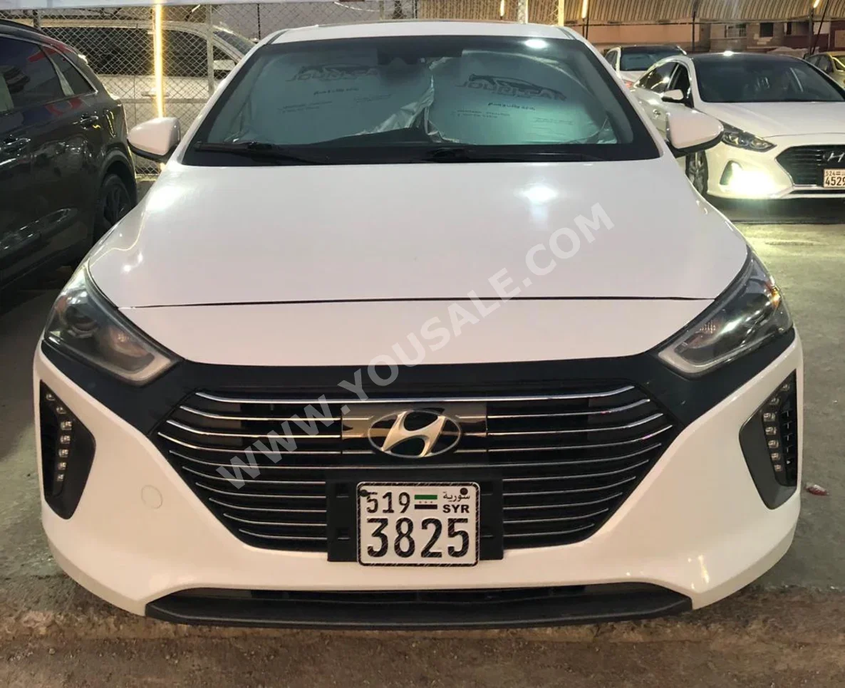 Hyundai  Ioniq  2019  Automatic  99,000 km  4 Cylinder  FWD  Sedan  White  Gasoline
