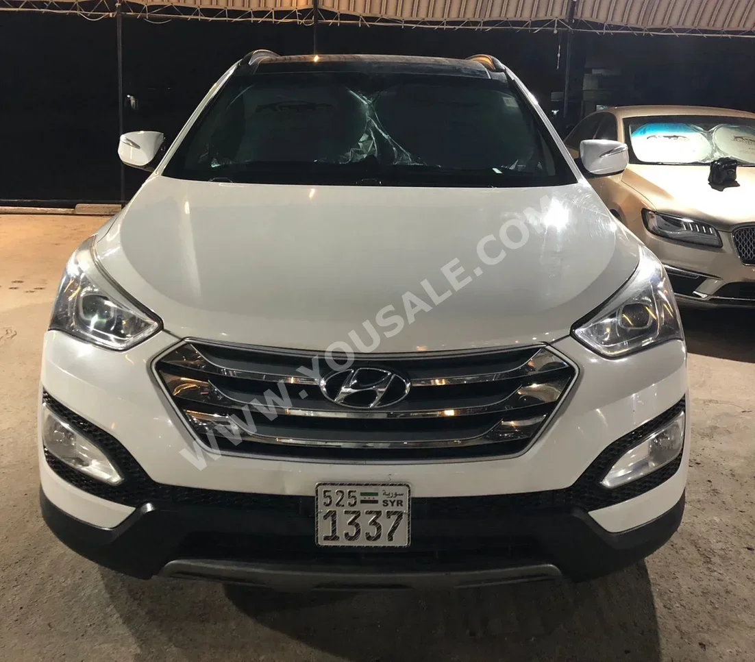 Hyundai  Santa Fe  2015  Automatic  107,000 km  4 Cylinder  4WD  SUV  White  Gasoline