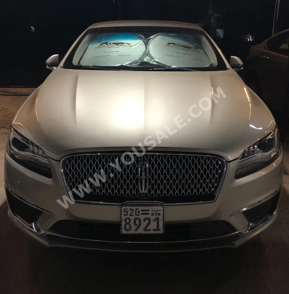 Lincoln  MKZ  2018  Automatic  170,000 km  6 Cylinder  RWD  Sedan  Gold  Hybrid
