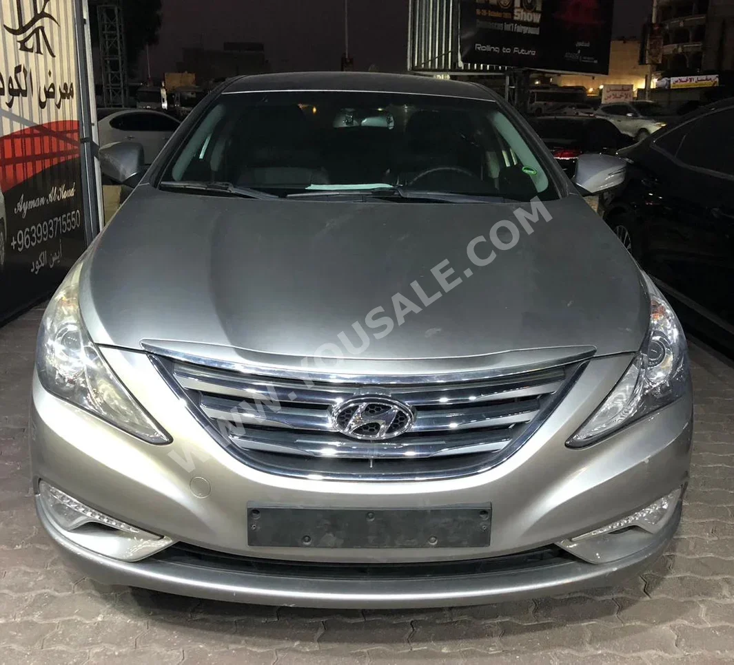 Hyundai  Sonata  2013  Automatic  95,000 km  4 Cylinder  FWD  Sedan  Silver  Gasoline