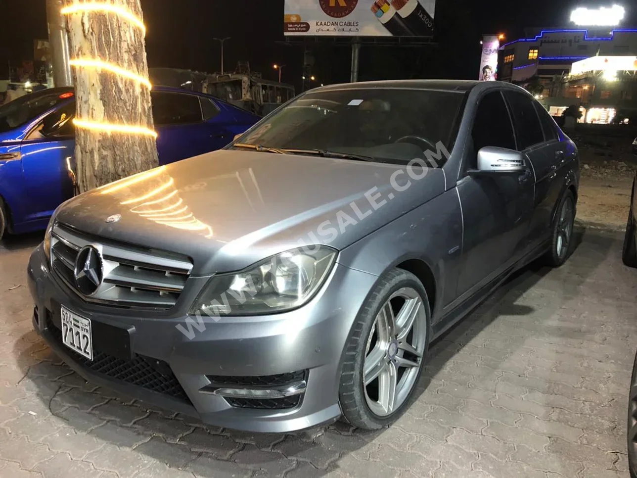 Mercedes-Benz  C-Class  200  2012  Automatic  170,000 km  6 Cylinder  RWD  Sedan  Silver  Gasoline