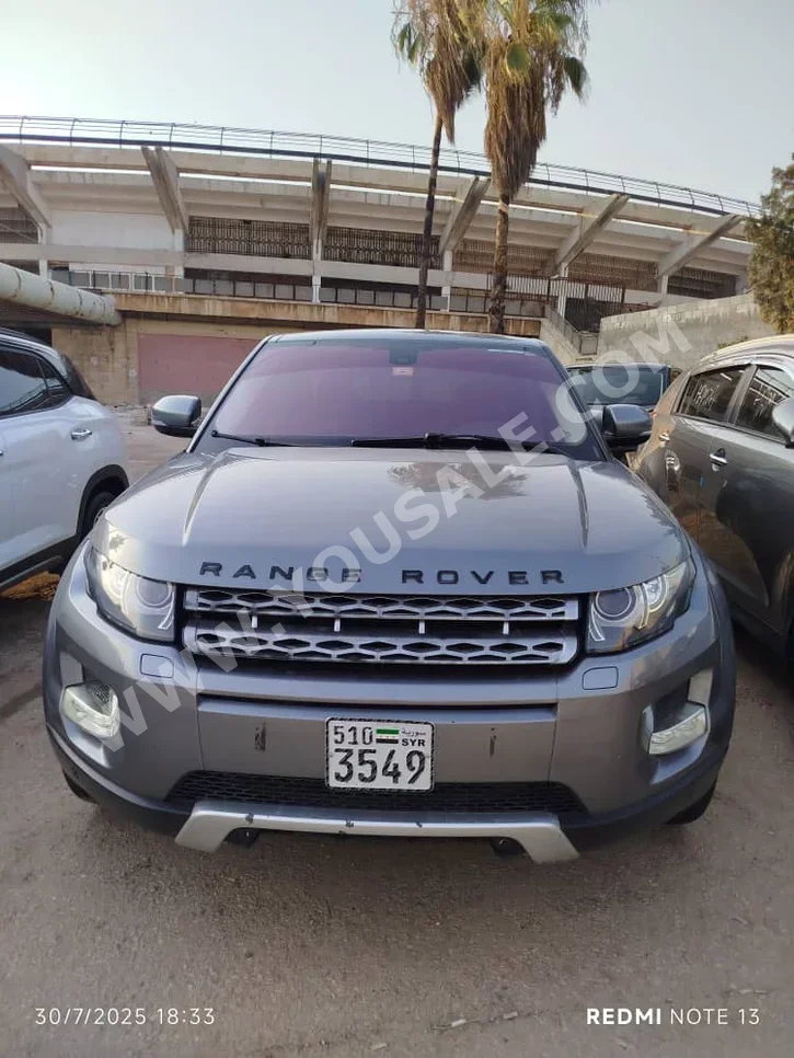 Land Rover  Evoque  2014  Automatic  180,263 km  4 Cylinder  4WD  SUV  Silver  Gasoline